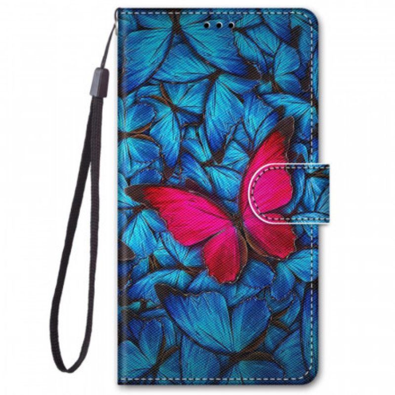 Etui Folio do Xiaomi Redmi Note 11 Pro Plus 5G Czerwony Motyl Niebieskim Tle