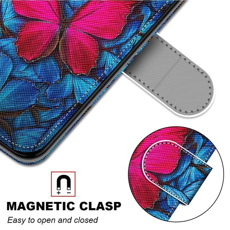 Etui Folio do Xiaomi 13 Czerwony Motyl Niebieskim Tle